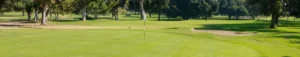 Putting green with flagstick at William Land Golf Course in Sacramento