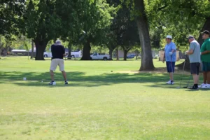 Group of golfers teeing off at William Land Golf Course in Sacramento