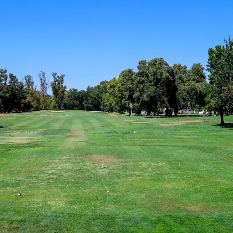 William Land Golf Course fairway view with tee markers in Sacramento